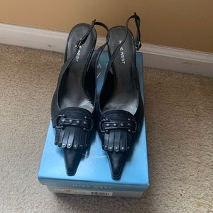 Black slingback pumps